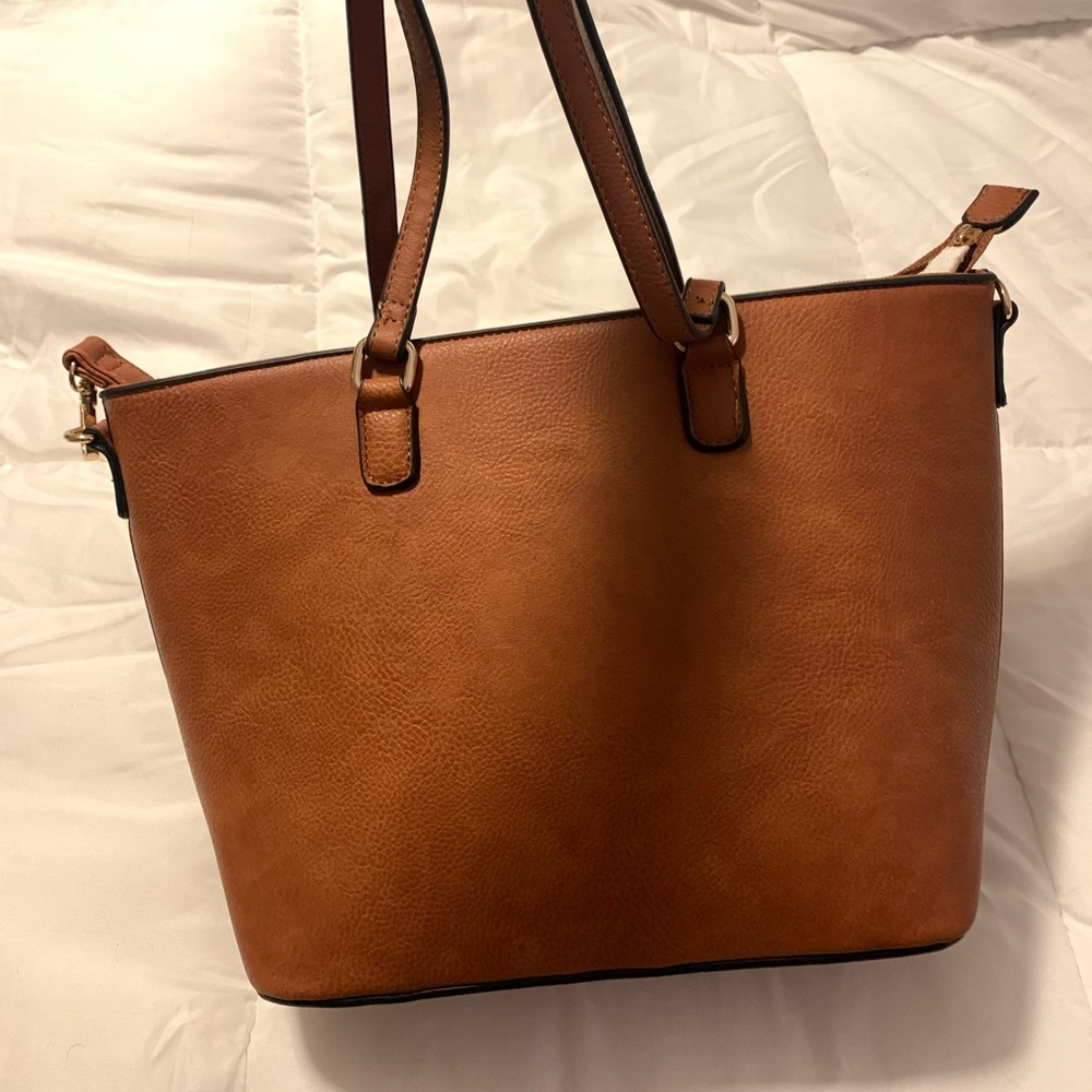 Cognac colored vegan leather purse.